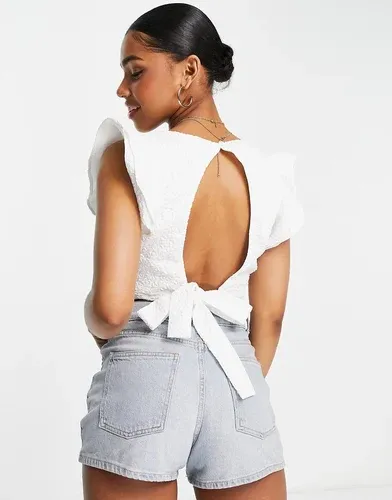 Blusa blanca texturizada sin mangas con volantes en los hombros de The Frolic-Blanco (8047415)