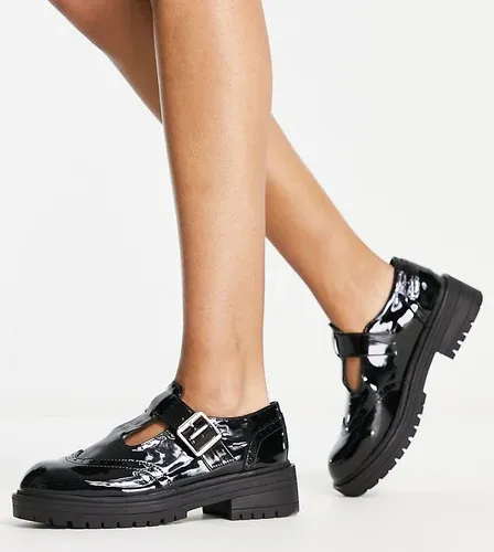 Zapatos negros con diseño de T y suela gruesa de charol Luca de schuh Wide Fit (8155940)