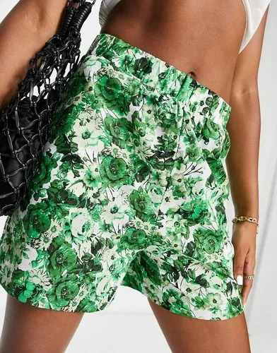 Pantalones cortos verdes con estampado floral de Mango (8209461)